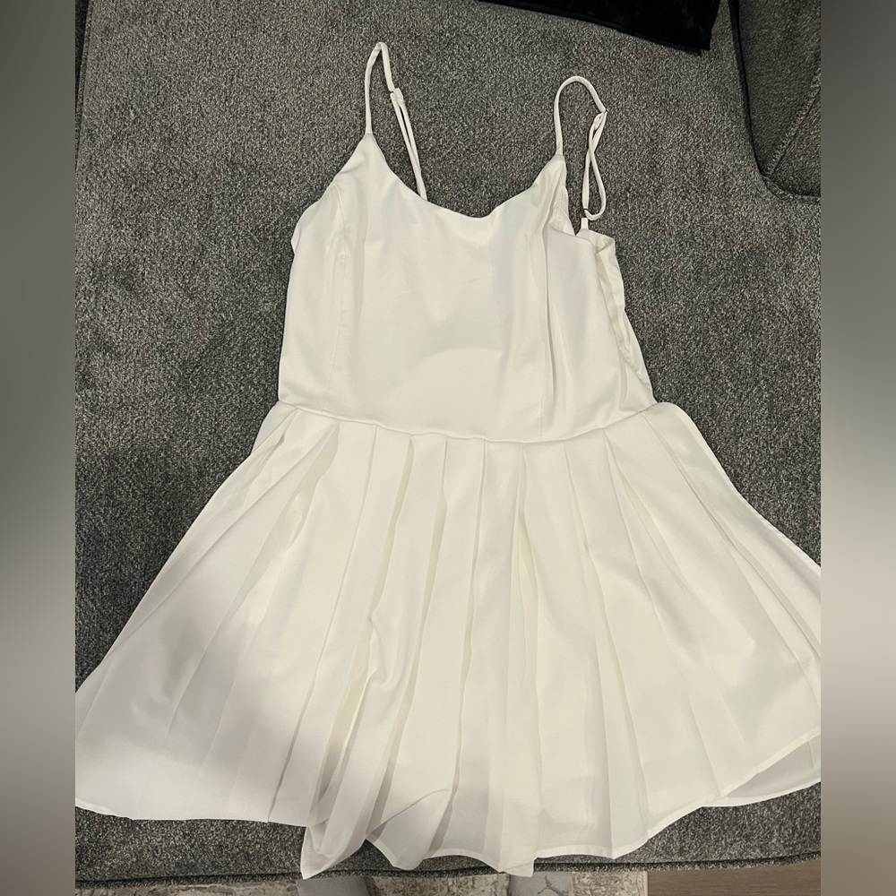 White romper with pleated bottom